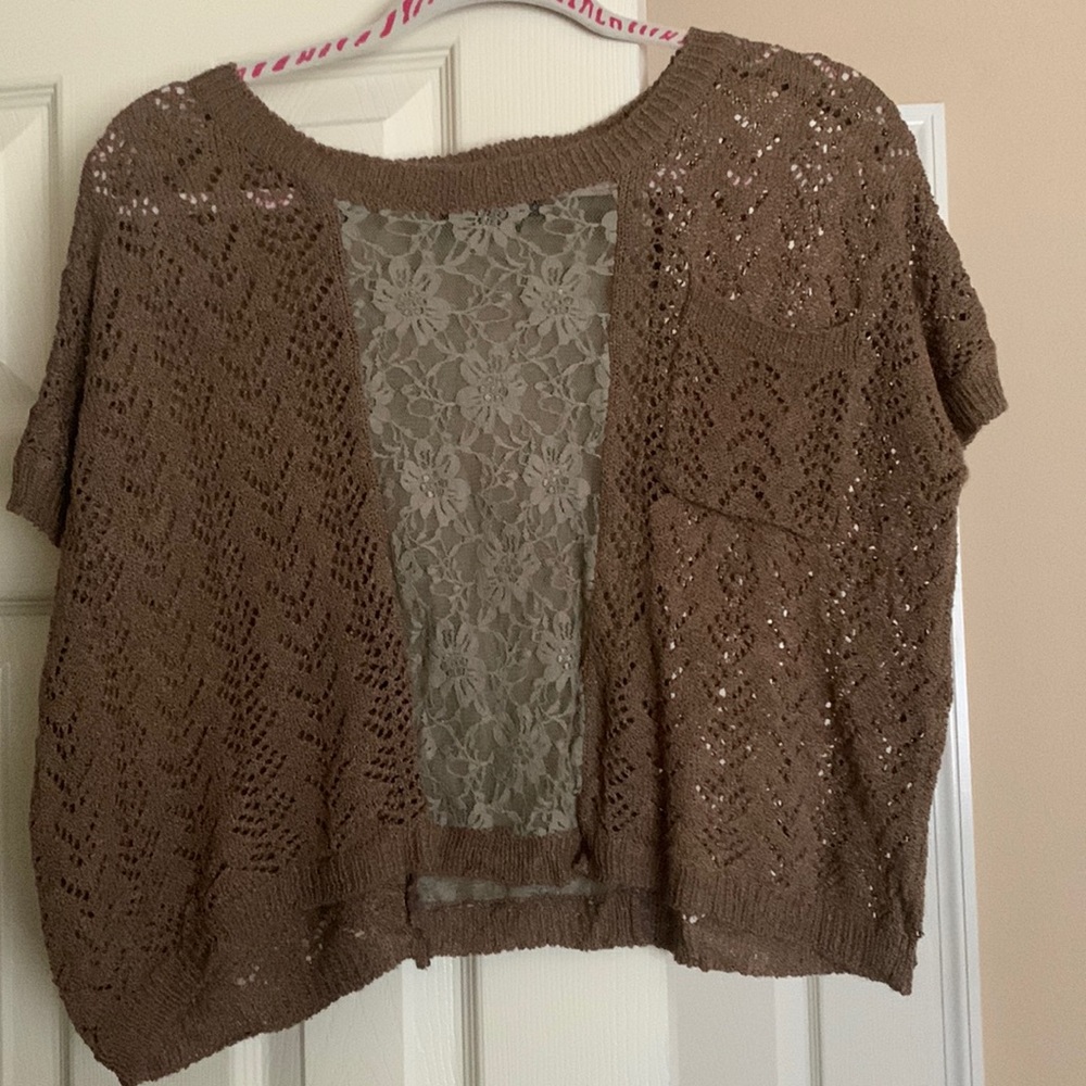 Saywhat knit top with a cute design and floral pattern